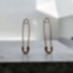 Safety pin earrings gold