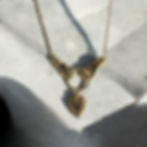 Hand on heart necklace gold