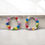 Thumbnail: Cookie - Smiley Face Hoop Earrings
