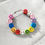 Thumbnail: Cookie - Smiley Face Hoop Earrings