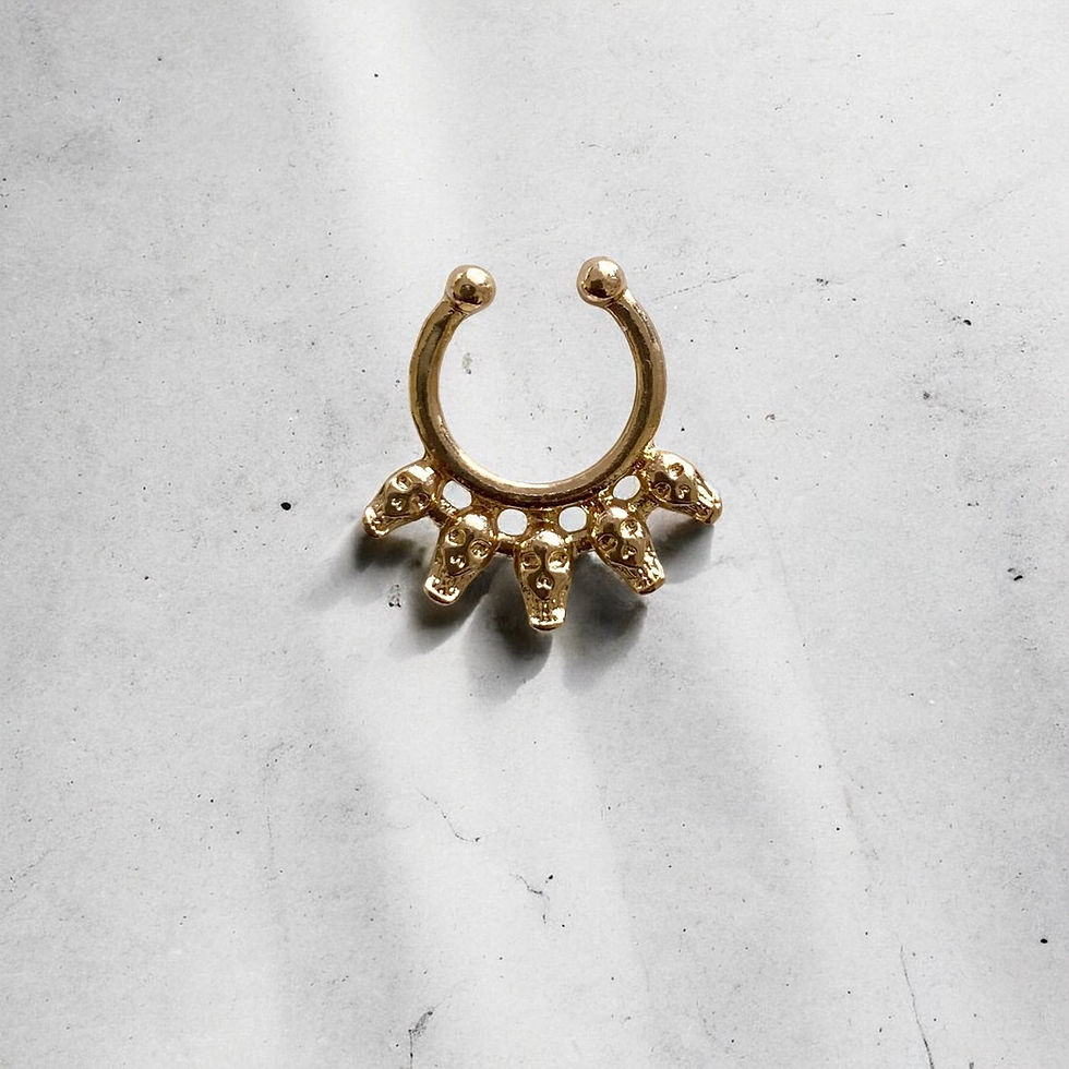 Faux skull septum ring gold