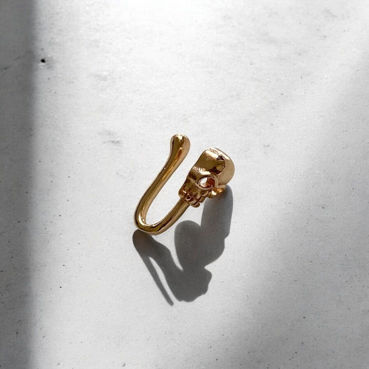 Faux skull nose ring gold