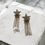 Miniatura: Sparkly star earrings