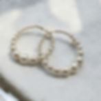 Large pearl hoop earrings