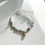 Miniaturbild: Pearl and bead initial necklace