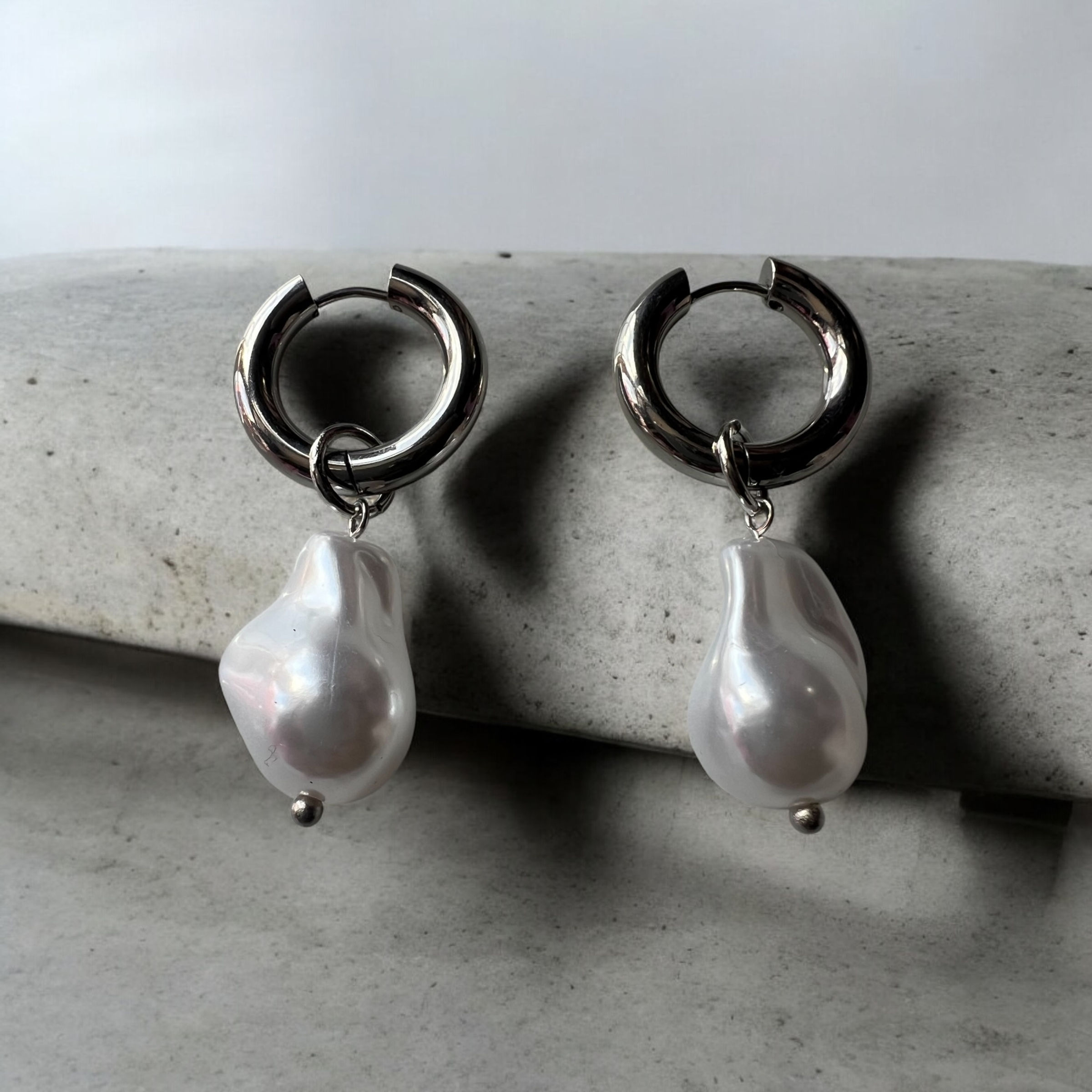 Huggie pearl hoop earrings silver