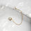 Thumbnail: Crystal and chain faux septum ring gold