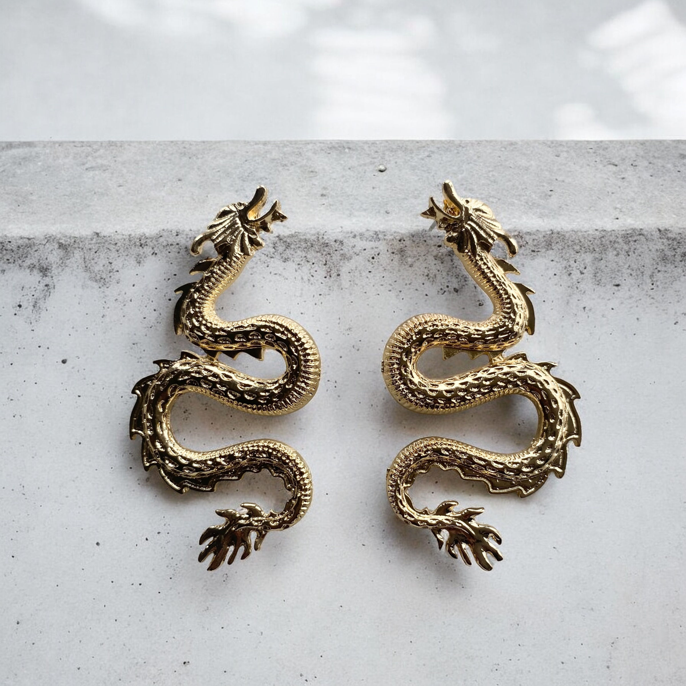 Dragon earrings gold