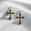 Miniatura: Large gold cross earrings