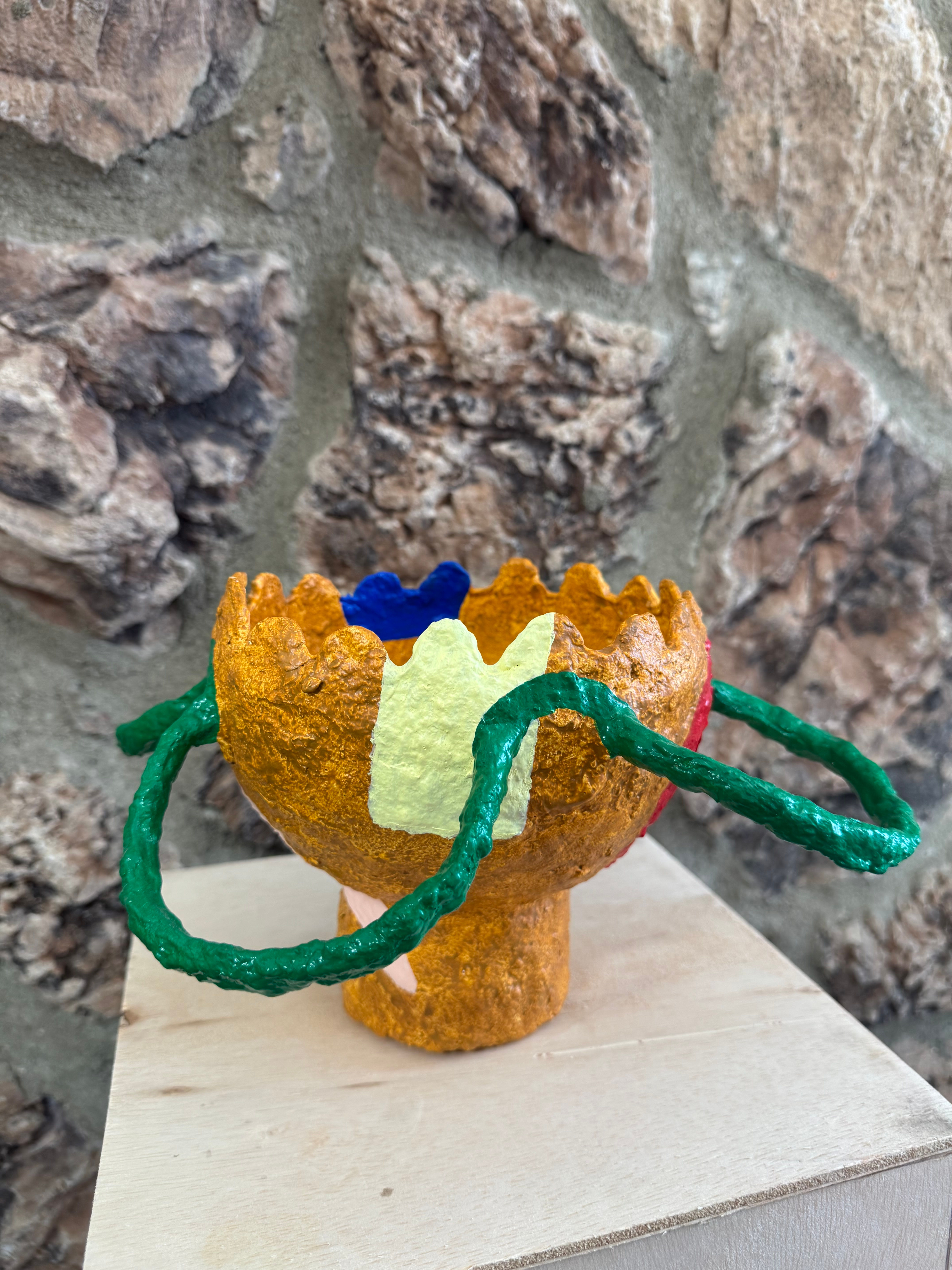 Papier mâché bowl with irregular handles