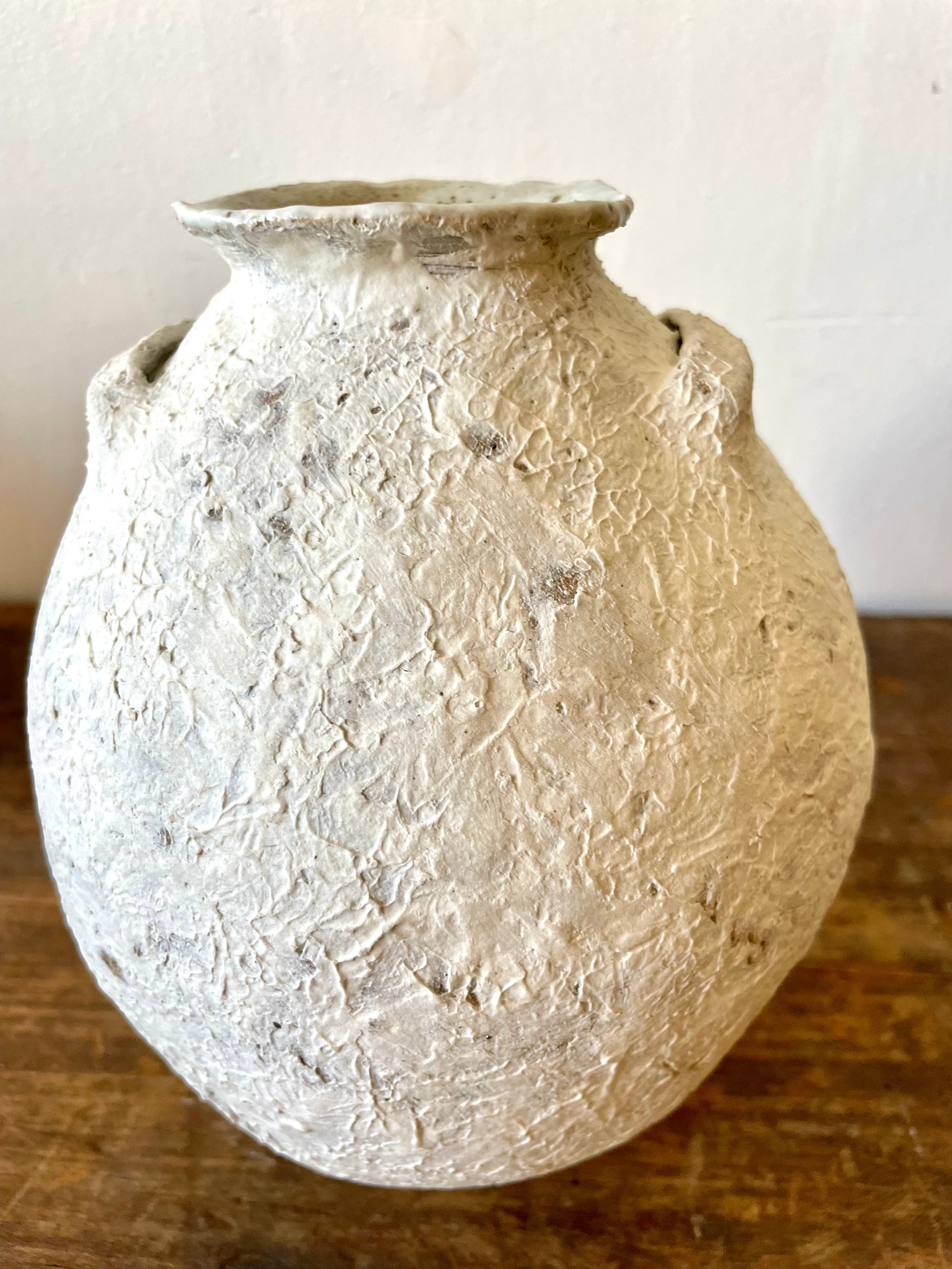 Raw ceramic vessel with handles