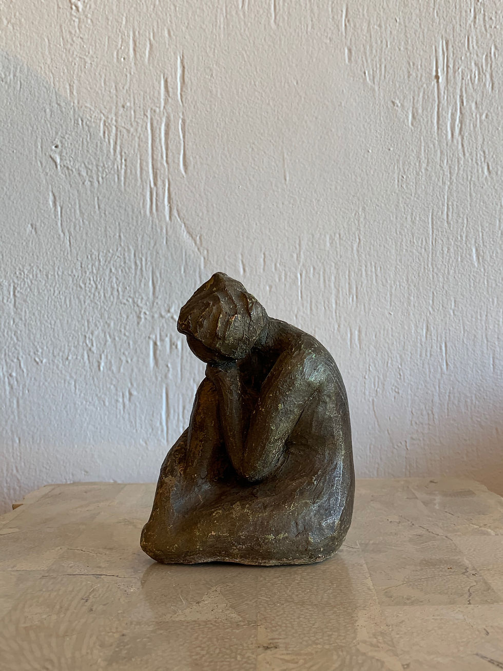 Thumbnail: pondering woman