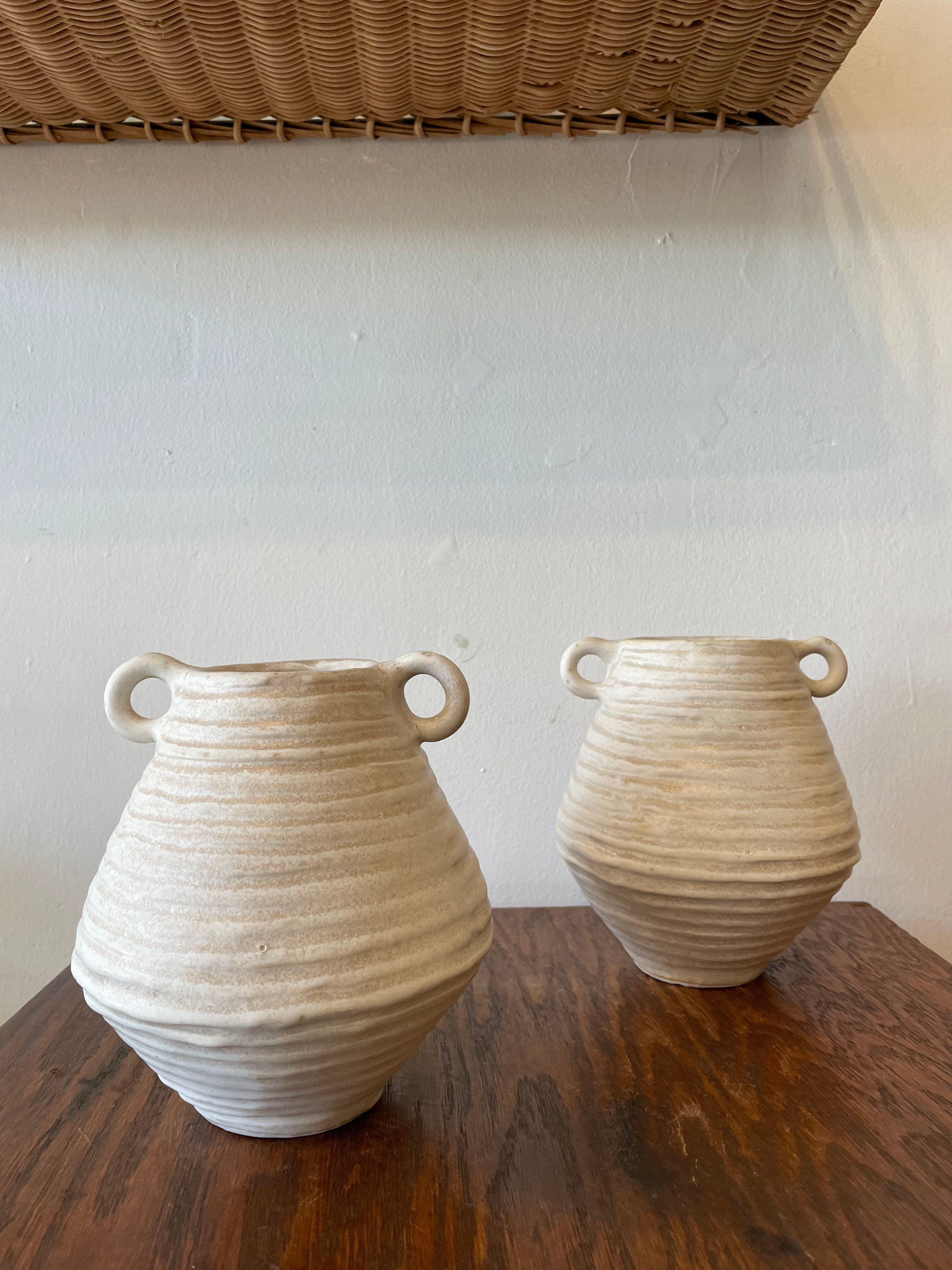 Small White Ceramic sculptural vessels by Clare Fawn