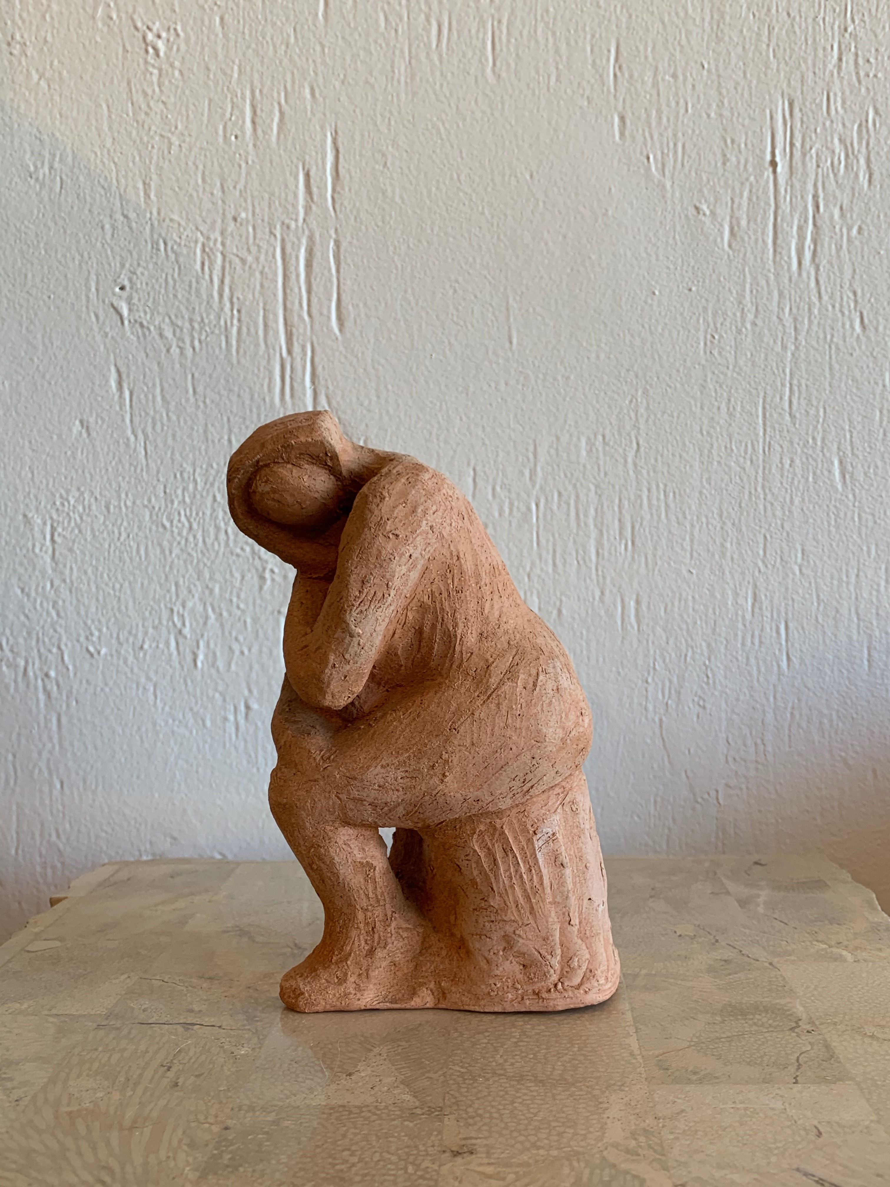 Resting Female on Stool