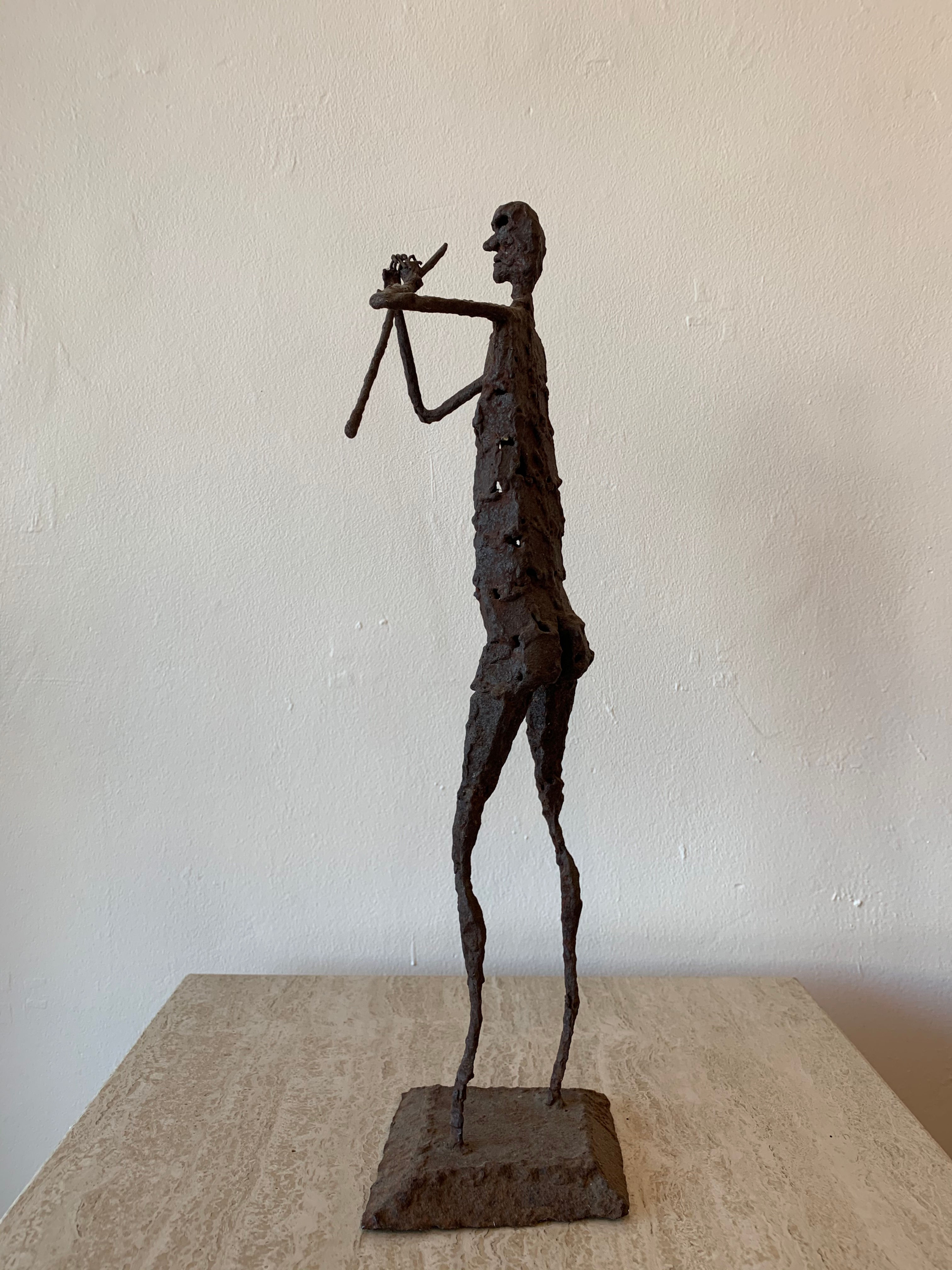 Brutalist Man with Stick