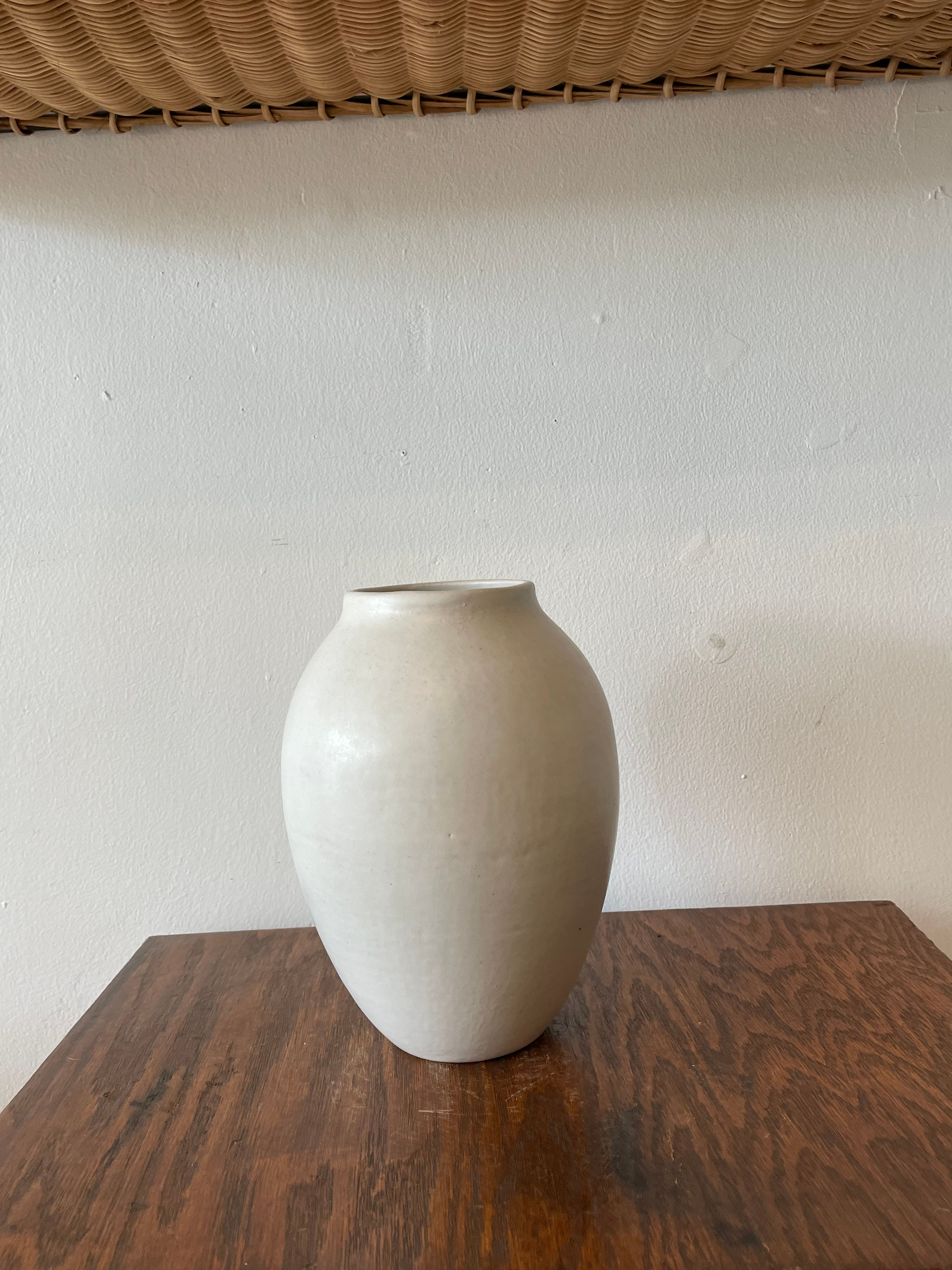 Tall white ceramic  vase