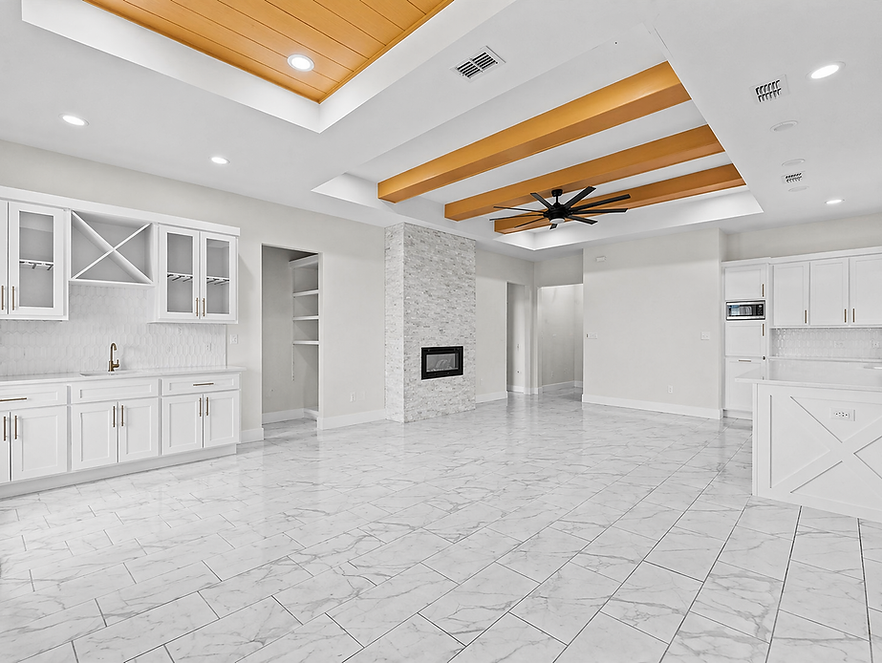 Modern minimalist living space with stone fireplace.png