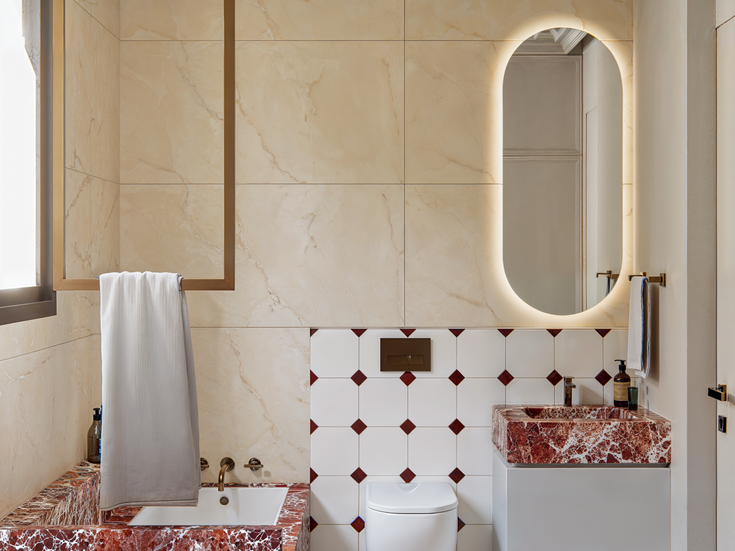 Bathroom vanity render with red marble countertop, sink and wall mirror.