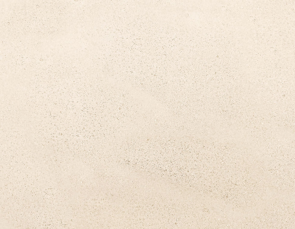 Light beige stone plaster texture with tiny pores and soft neutral architectural surface.j