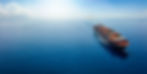 Aerial panorama of a cargo ship carrying container for import and export, business logisti