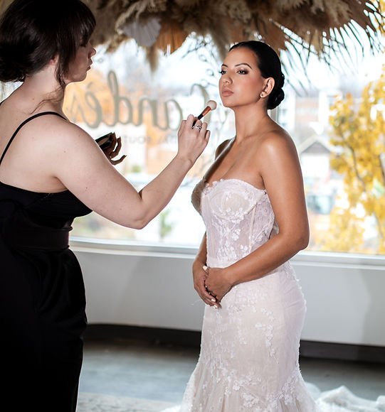 sylvia applying bridal makeup