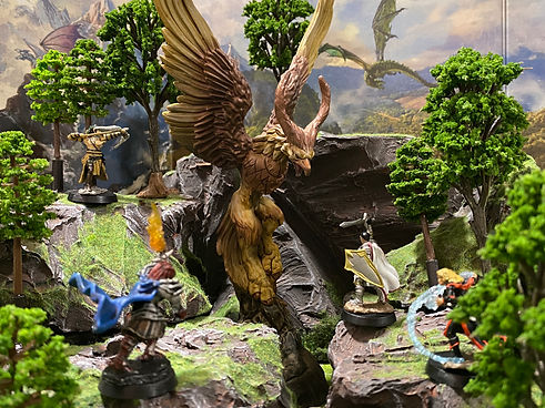 Dungeons & Dragons miniature adventurers fight a griffin in dynamic environment