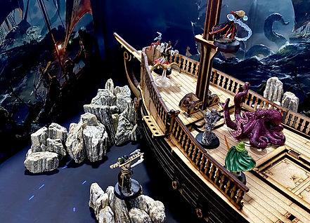 Dungeons & Dragons miniature pirate ship fight scene between heroes and octopus