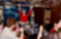 Dungeon master setting the scene in a decorated RPG Taverns game room