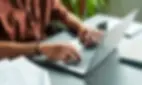 person-typing-on-a-laptop-featured-image-736x440.jpg.webp