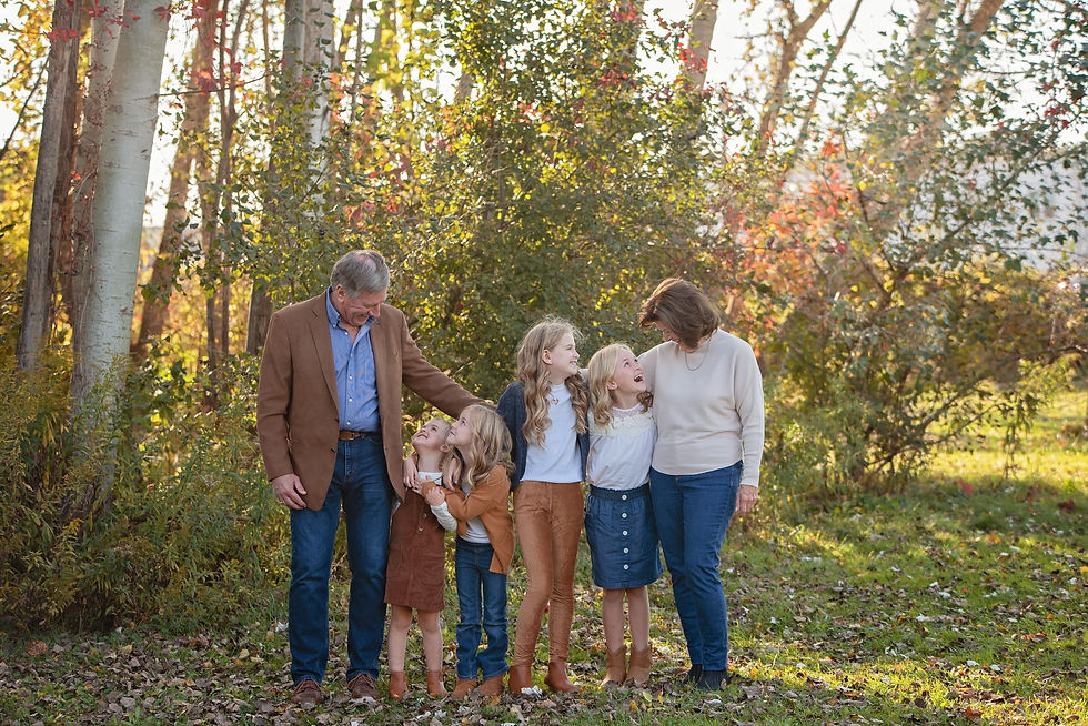 Family photography in Cambridge Ontario with matching neutral outfits.

