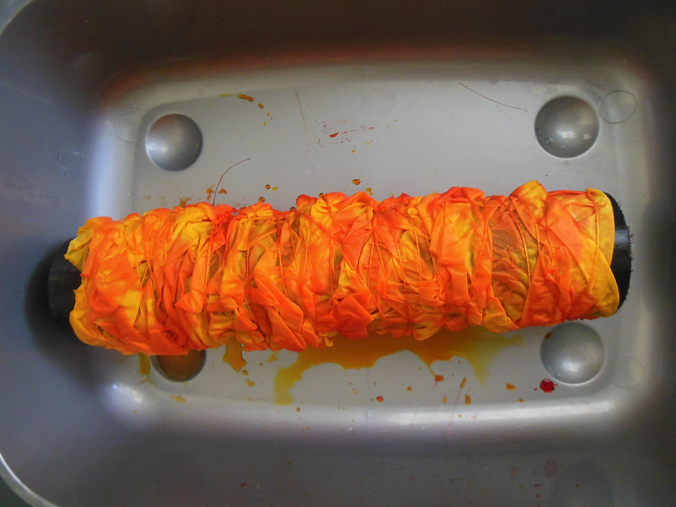 Drain pipe resist fabric dyeing in progress.