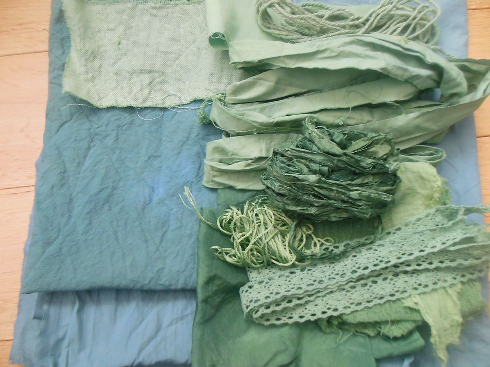 Green fabric dyed using plastic bag technique.