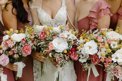 floral bouquets held by the bride and her bridesmaids