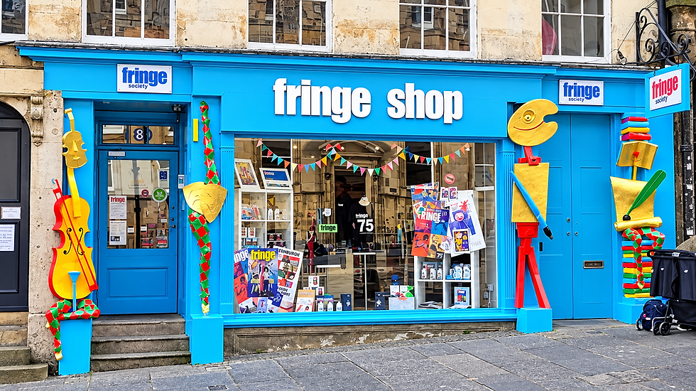 Vibrant Fringe Shopfront on a Cobblestone Street.png