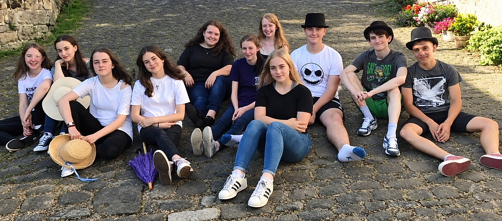 Sunlit Courtyard Group Portrait.png