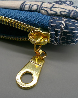 Gold Zipper Pull Detail