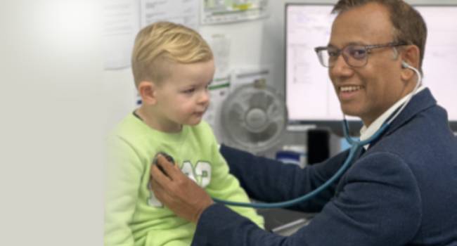 Doctor caring for young patient