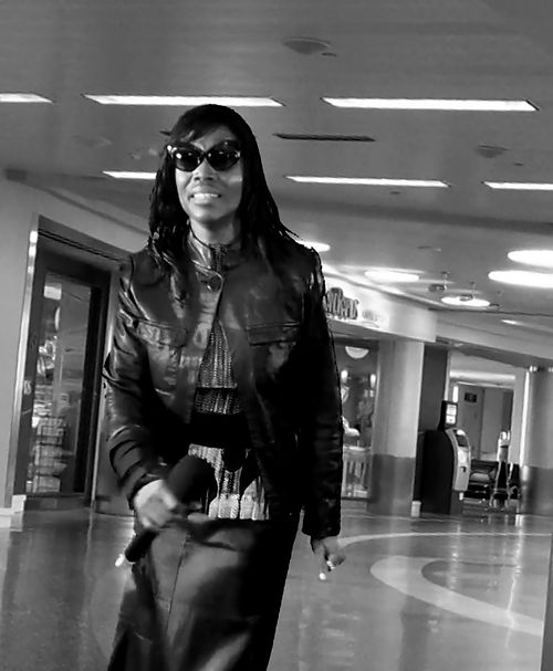 With Microphone In Her Hand