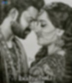 Pencil sketch of two people with foreheads touching, wearing ornate jewelry. "Baahubali 2" text at bottom. Emotional and intimate mood.