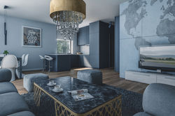 Apartament „Navy Loft – nastrojowy salon z granatową zabudową.