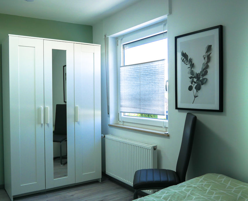 In jedem der beiden Schlafzimmer befindent Sich ein Kleiderschrank