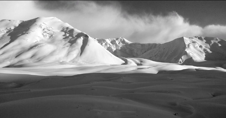 Wide glacial expanse of Stan Urkaan Glacier with 6000m unclimbed peaks in the Karakoram