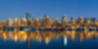 vancouver-downtown-architecture-boat-with-water-reflections-dusk-panorama.jpg