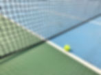 Ball on Tennis Court