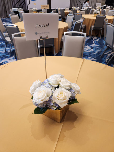 Centerpiece with reserved sign