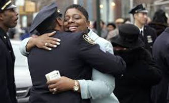 officer hugging lady.jpg