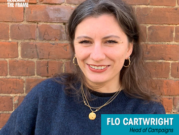 A photo of Flo Cartwright, smiling warmly. She is wearing a navy blue blouse and standing in front of a brick wall. The Reclaim The Frame logo appears in the top left-hand corner. Text overlay reads: “Welcome Flo Cartwright – Head of Campaigns, Reclaim The Frame.”