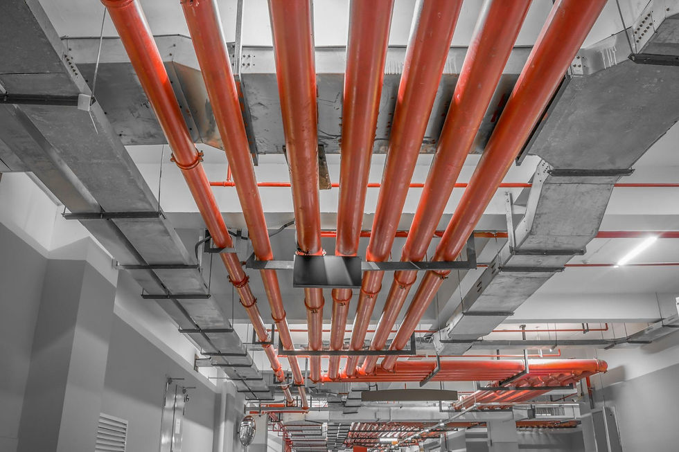 Industrial-building-with-red-pipe-fire-sprinkler-system.jpg