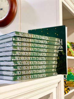Sky High South Dakota is one of the BEST coffee table books! It features photography of the entire state of SD from a bird’s eye view.