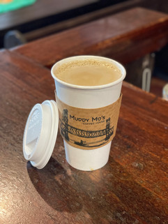 Get your coffee to go or stick around and enjoy it while you hang in the coffee house.